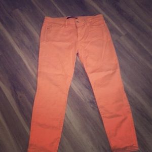Fun sherbet orange skinny jeans